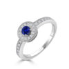 Anillo de oro con zafiro central y diamantes talla brillante laterales