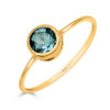 Anillo de oro chaton topacio azul